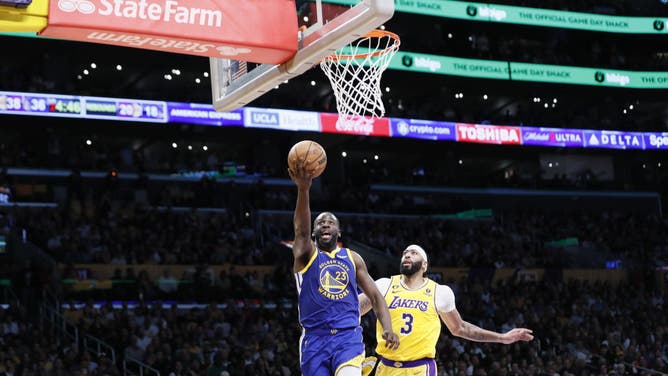 Warriors PF Draymond Green drives past Lakers big Anthony Davis in Game 4 of the NBA Western Conference Semifinals at Crypto.com Arena.