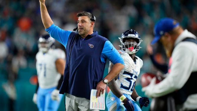 Tennessee Titans head coach Mike Vrabel calls for an extra point after a TD vs. the Dolphins at Hard Rock Stadium in Miami.