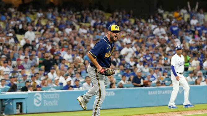 Brewers LHP Wade Miley grimaces after making a play on an infield vs. Dodgers at Dodger Stadium in Los Angeles.
