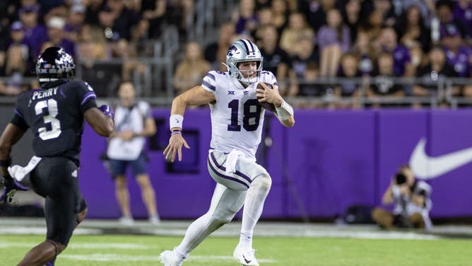 Kansas State Wildcats QB Will Howard runs up field against the TCU Horned Frogs at Amon G. Carter Stadium in Fort Worth, Texas.