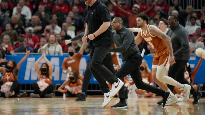 Texas Longhorns head coach Chris Beard celebrates after a timeout against the Purdue Boilermakers in the second round of the 2022 NCAA Men's Basketball Tournament at Fiserv Forum in Milwaukee, Wisconsin.