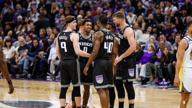The Kings huddle up vs. the Warriors during Game 2 of the 2023 NBA Playoffs at Golden 1 Center.