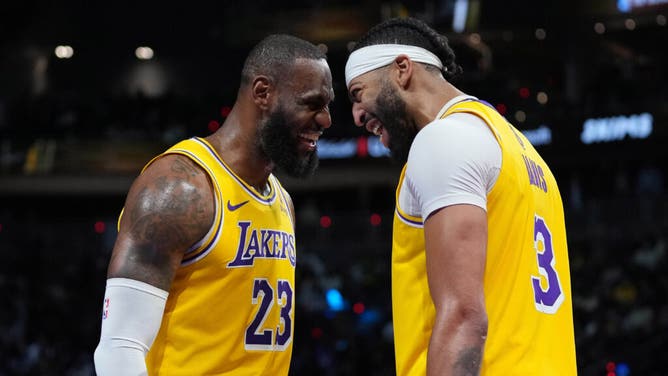 Los Angeles Lakers' LeBron James and Anthony Davis celebrate after winning the NBA In-Season Tournament at T-Mobile Arena in Las Vegas.