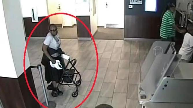 Elderly Bank Robber Using A Walker