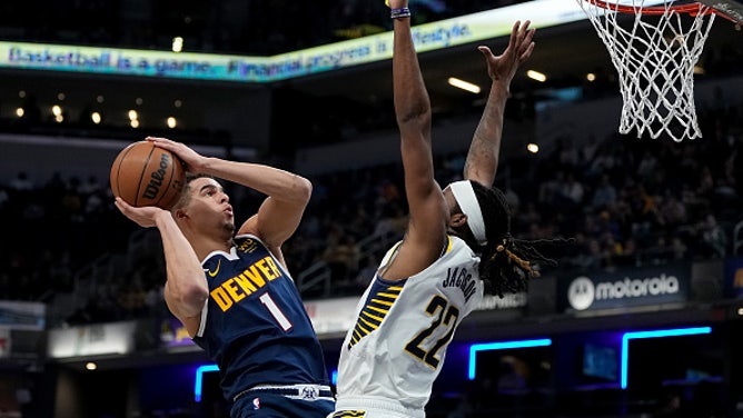 Michael Porter, Jr attempts a shot against the Indiana Pacers.
