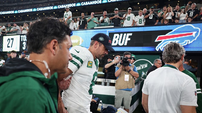 Aaron Rodgers was taken to the medical tent for evaluation by Jets doctors.