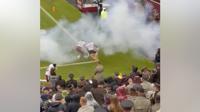 Texas A&M cannon goes off in UMass game.