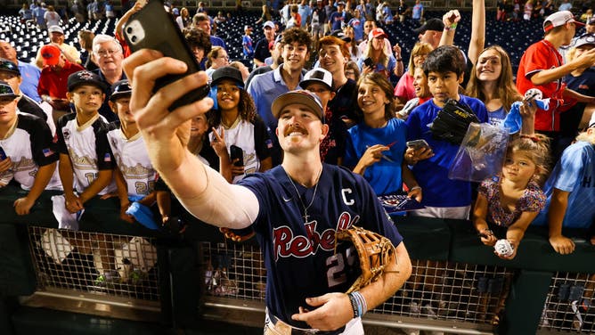 Tim Elko takes a selfie with fans