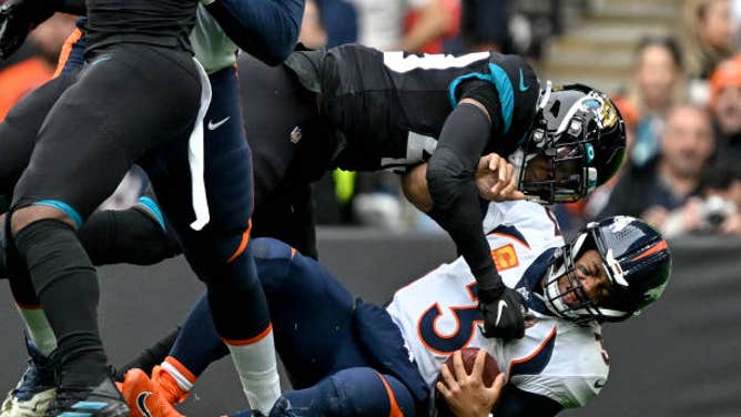 Russell Wilson of the Denver Broncos was down but got back up against the Jacksonville Jaguars.