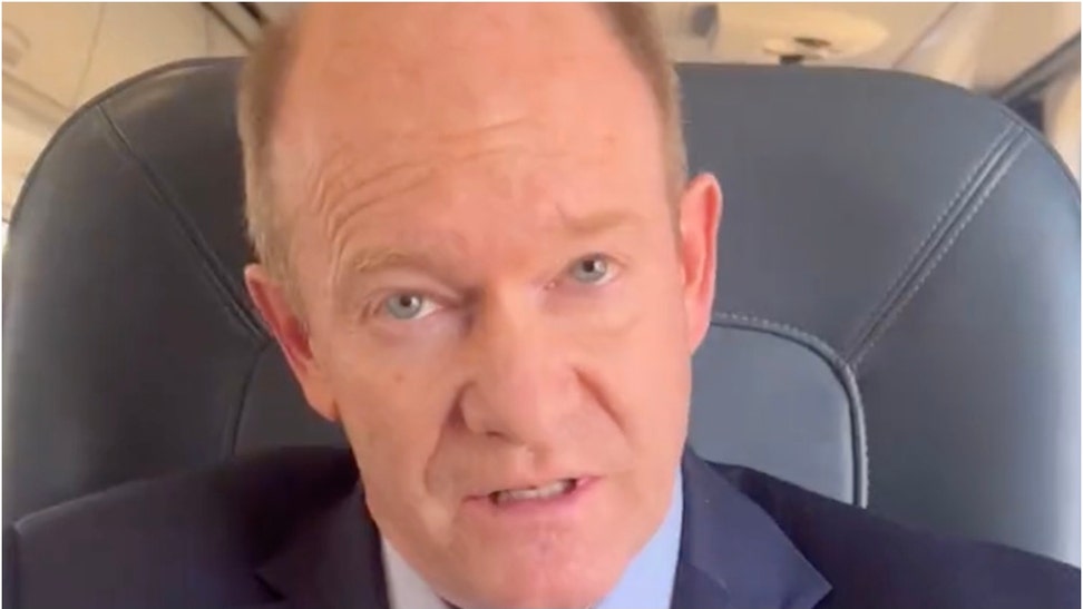 Aaron Mate from The Grayzone harassed and badgered Senator Chris Coons in embarrassing fashion. What is the webste? (Credit: Screenshot/X Video Aaron Mate)