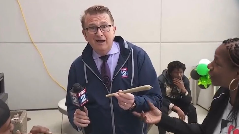 Fox 2 reporter Charlie Langton holding a massive blunt on 420 day in Detroit Courtesy of Fox News 2