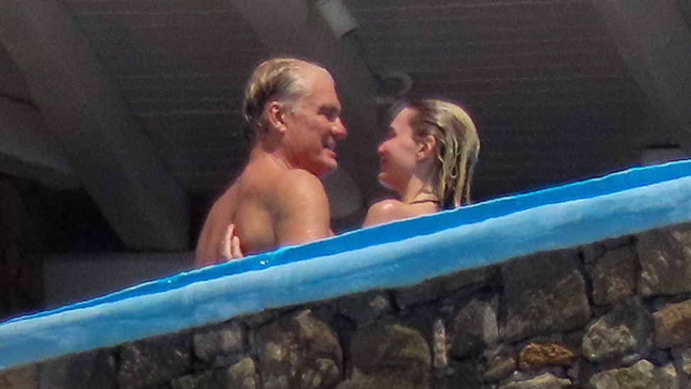 b0db7370-EXCLUSIVE: Dolph Lundgren goes shirtless during romantic Greek vacation with much younger fiancee Emma Krokdal amid his lung cancer battle.