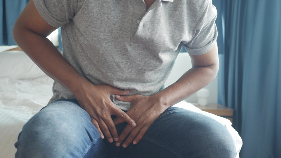 the concept of prostate and bladder problem, crotch pain of a young person