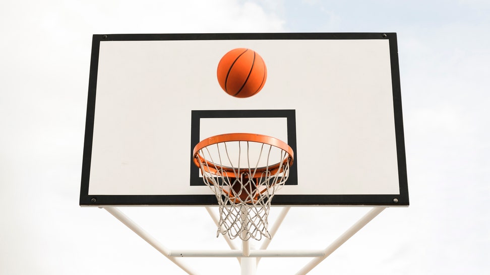 Low angle view of basketball hoop against sky