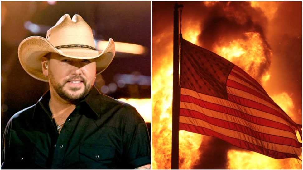 Jason Aldean went bold with his music video for "Try That In A Small Town." People aren't happy. The video shows riot footage. (Credit: Getty Images)