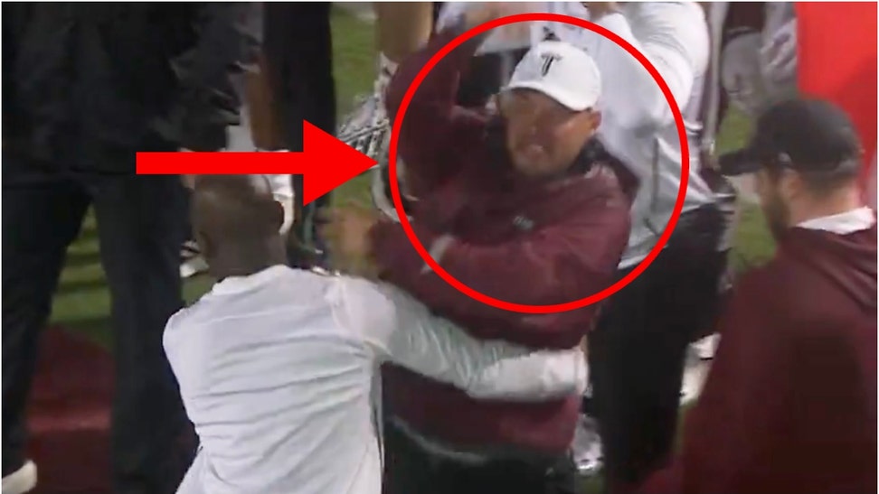 Troy coach Jon Sumrall flips out after missed facemask call. (Credit: Screenshot/Twitter Video https://twitter.com/SickosCommittee/status/1731095599875752226)