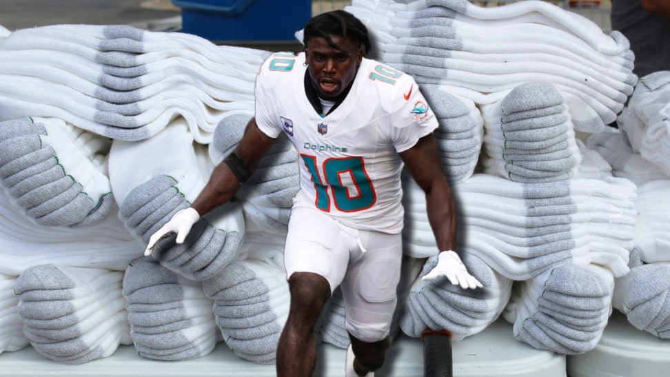 Tyreek Hill and a pile of socks