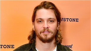 "Yellowstone" star Luke Grimes is releasing a self-titled country music album in March. How many songs are on the album? What are the details? (Credit: Getty Images)