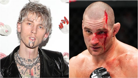 UFC superstar Sean Strickland brutally roasted Machine Gun Kelly. Watch a video of Strickland verbally tearing him up. (Credit: Getty Images)