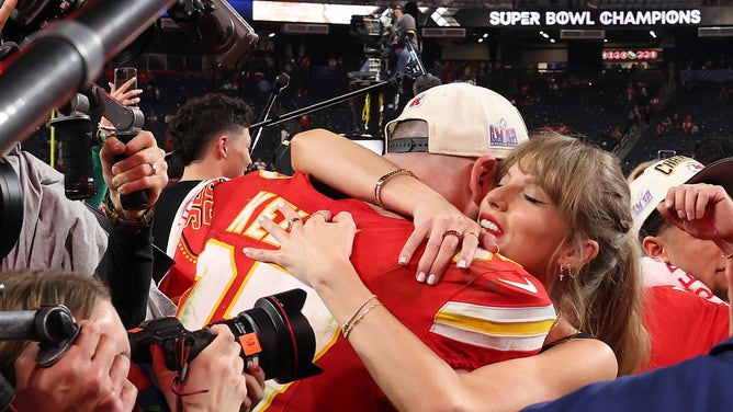 Travis Kelce is a fan of Taylor Swift's beer drinking skills. (Photo by Jamie Squire/Getty Images)