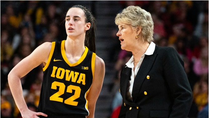 Iowa basketball coach Lisa Bluder talks to star Caitlin Clark during a recent game.