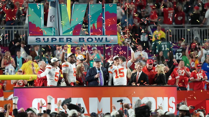 Kansas City Chiefs QB Patrick Mahomes celebrates on the podium with the Vince Lombardi Trophy after defeating the Philadelphia Eagles in Super Bowl LVII at State Farm Stadium in Arizona. (Joe Camporeale-USA TODAY Sports)