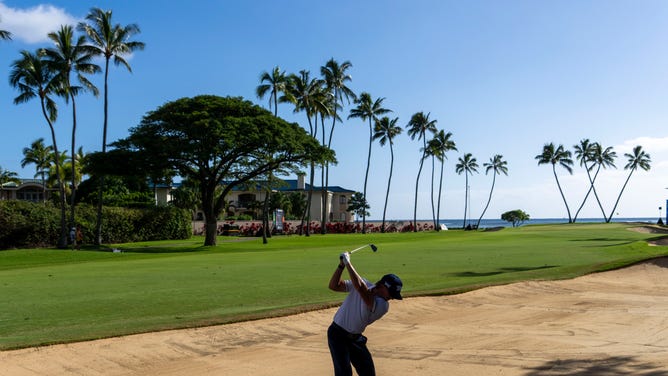 Jake Knapp hits a bunker shot during the 2024 Sony Open at Waialae Country Club in Hawaii.