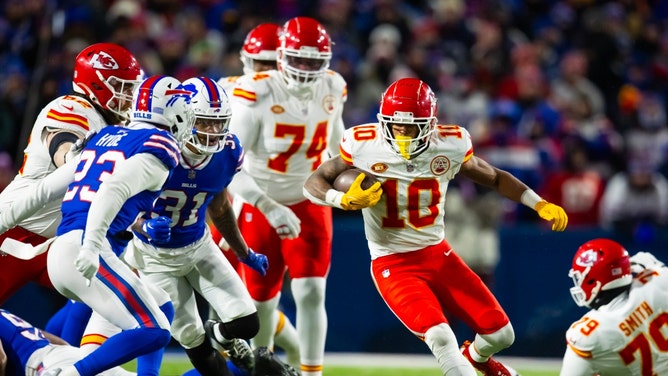 Kansas City RB Isiah Pacheco carries the ball against the Buffalo Bills in the 2024 AFC divisional round at Highmark Stadium in New York.