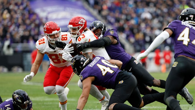 Kansas City Chiefs TE Noah Gray gets tackled by Baltimore Ravens LB Roquan Smith after a catch in the AFC title game at M&T Bank Stadium.