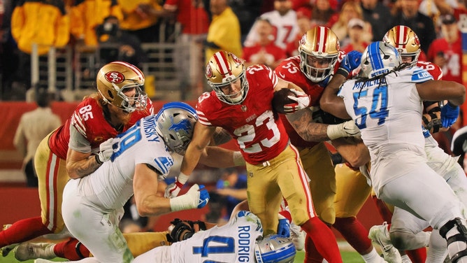 San Francisco 49ers RB Christian McCaffrey runs with the ball vs. the Detroit Lions in the 2024 NFC Championship football game at Levi's Stadium in Santa Clara, California. (Kelley L Cox - USA TODAY Sports)