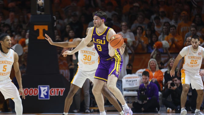 LSU Tigers C Will Baker looks to pass the ball vs. the Tennessee Volunteers in Thompson-Boling Arena at Food City Center.