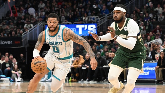 Charlotte Hornets SF Miles Bridges drives to the hoop on Milwaukee Bucks SF Jae Crowder at Fiserv Forum in Wisconsin. (Michael McLoone-USA TODAY Sports)