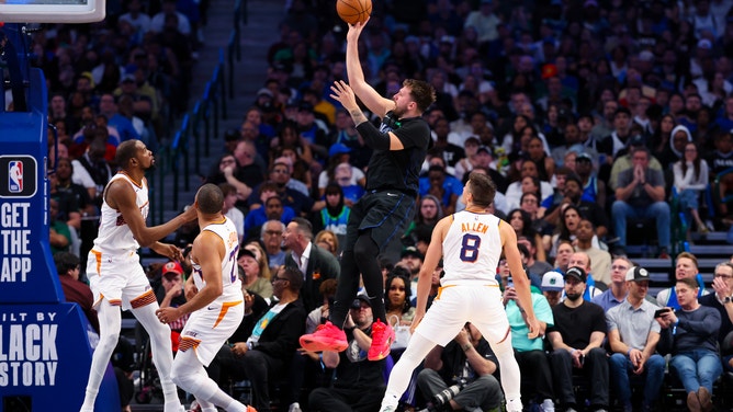 Dallas Mavericks All-Star Luka Doncic shoots a floater on the Phoenix Suns at American Airlines Center in Texas. 