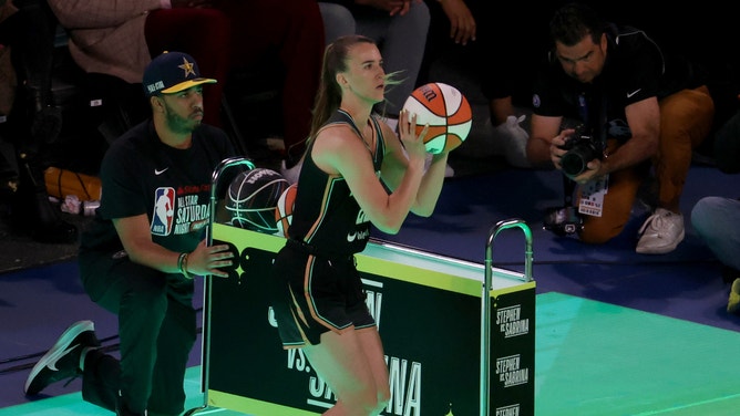 New York Liberty guard Sabrina Ionescu (20) competes in the Stephen vs. Sabrina 3-Point Challenge during NBA All Star Saturday Night at Lucas Oil Stadium.