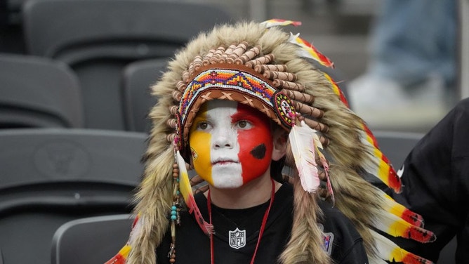 Young fan of the Kansas City Chiefs Holden Armenta waits for the start of Super Bowl LVIII between the Kansas City Chiefs and the San Francisco 49ers at Allegiant Stadium in Las Vegas, Nevada, on February 11, 2024.