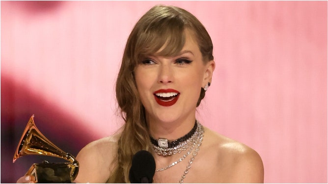 Police reportedly are investigating Taylor Swift's dad Scott over an alleged altercation in Australia. What are the details? (Photo by Kevin Winter/Getty Images for The Recording Academy