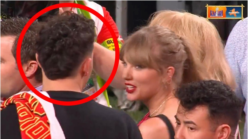 Taylor Swift appears to dip on Jackson Mahomes after the Chiefs win the Super Bowl. (Credit: Screenshot/X Video https://twitter.com/CBSSports/status/1756892349949489478)