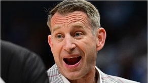 Alabama basketball coach Nate Oats dropped a savage line after the Crimson Tide beat UNC. Watch a video of his comment. (Credit: Getty Images)