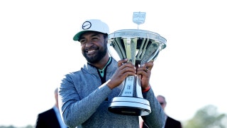 Tony Finau raises the championship trophy after winning the 2023 Houston Open at Memorial Park Golf Course. (Erik Williams-USA TODAY Sports)