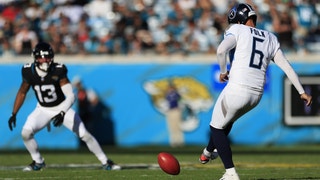 Tennessee Titans kicker Nick Folk attempts an onside kick as Jacksonville Jaguars wide receiver Christian Kirk looks on during the fourth quarter an NFL football game.