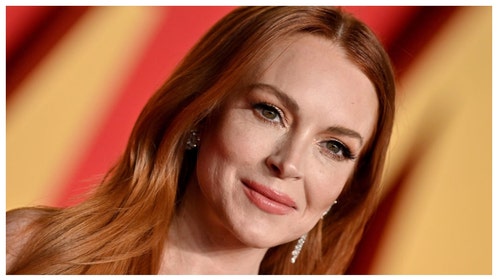 Lindsay Lohan promotes new Netflix movie Irish Wish in revealing dress. 