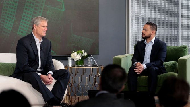NCAA president Charlie Baker is interviewed by Boston Globe Sports writer Chris Gasper at the Globe Summit 2023. (Photo by Pat Greenhouse/The Boston Globe via Getty Images)