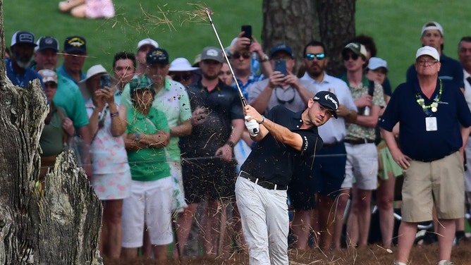 Brian Harman watches his ball after an approach shot from the pine straw at the 18th hole in THE PLAYERS Championship 2024 at TPC Sawgrass in Ponte Vedra Beach, Florida. (Bob Self/Florida Times-Union/USA TODAY )NETWORK