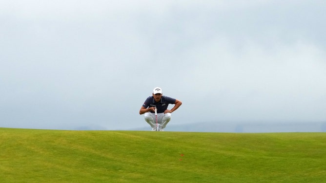 Min Woo Lee lines up his putt on the 17th green during the third round of The Open Championship 2023 at Royal Liverpool in England. (Kyle Terada-USA TODAY Sports)