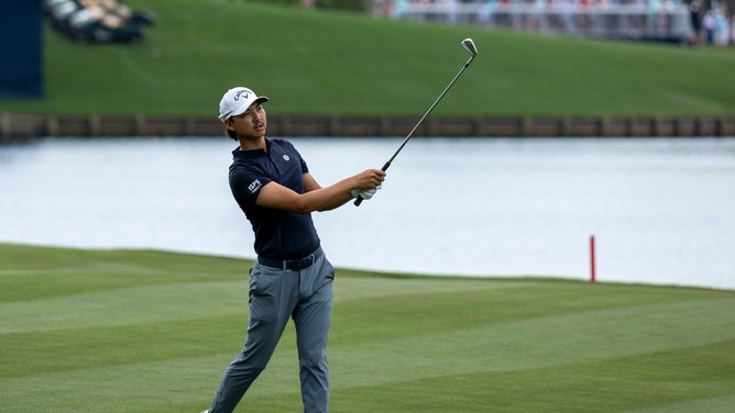 Min Woo Lee plays from the 18th fairway during the third round of THE PLAYERS Championship 2024. (David Yeazell-USA TODAY Sports)
