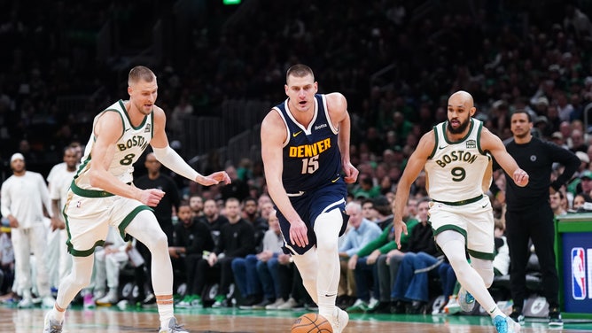 Denver Nuggets C Nikola Jokic gets out in transition vs. the Boston Celtics at TD Garden. (David Butler II-USA TODAY Sports)
