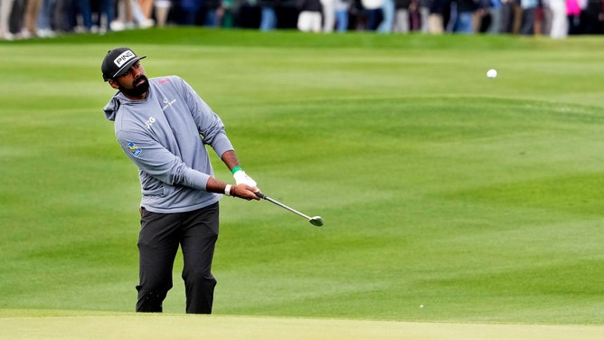 Sahith Theegala pitches onto the 17th green during Round 2 at the 2024 WM Phoenix Open at TPC Scottsdale in Arizona. (Rob Schumacher-USA TODAY Sports)