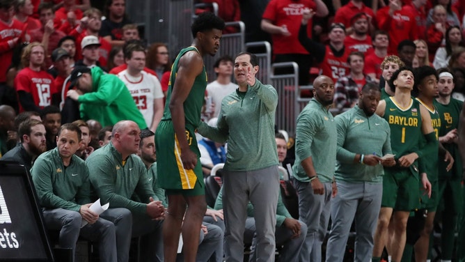 Baylor Bears head coach Scott Drew gives instructions to C Yves Missi against the Texas Tech Red Raiders at United Supermarkets Arena. (Michael C. Johnson-USA TODAY Sports)