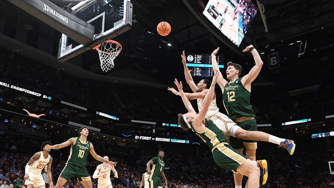 Texas Longhorns C Dylan Disu goes to the rack on the Colorado State Rams in the 2024 NCAA Tournament at Spectrum Center. (Bob Donnan-USA TODAY Sports)