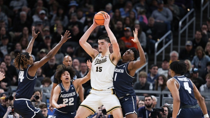 Purdue Boilermakers C Zach Edey looks to pass against the Utah State Aggies at Gainbridge FieldHouse in Indiana. (Trevor Ruszkowski-USA TODAY Sports)
